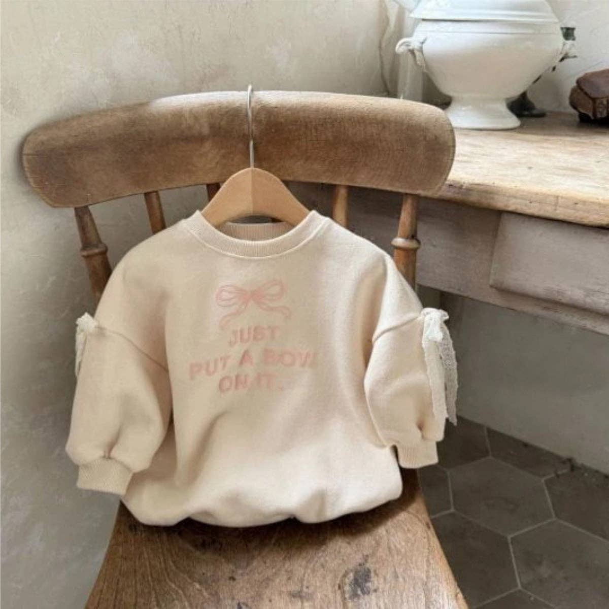 Bow Pattern Long Sleeve Bodysuit