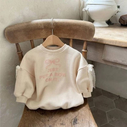 Bow Pattern Long Sleeve Bodysuit
